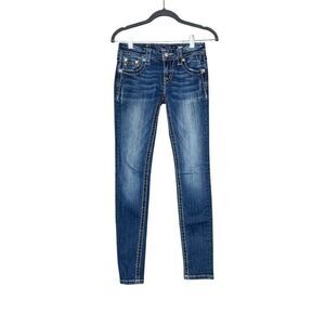 Miss Me medium wash signature skinny jeans size 25
